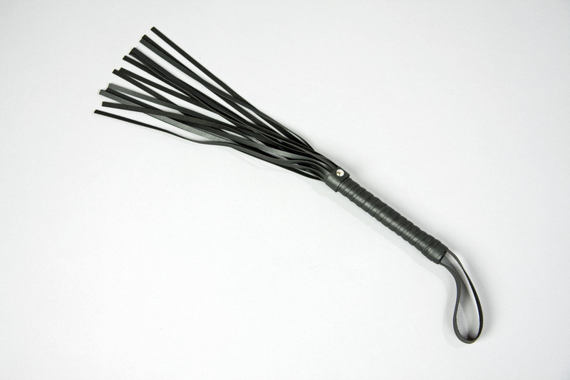 Kunstlederpeitsche schwarz, ca. 58 cm