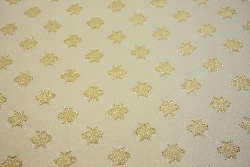 1m Brokat beige mit Goldsternen