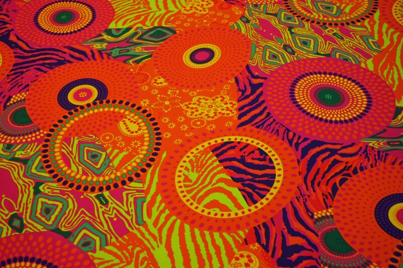 1m Jersey elastisch orange-bunte Kreise